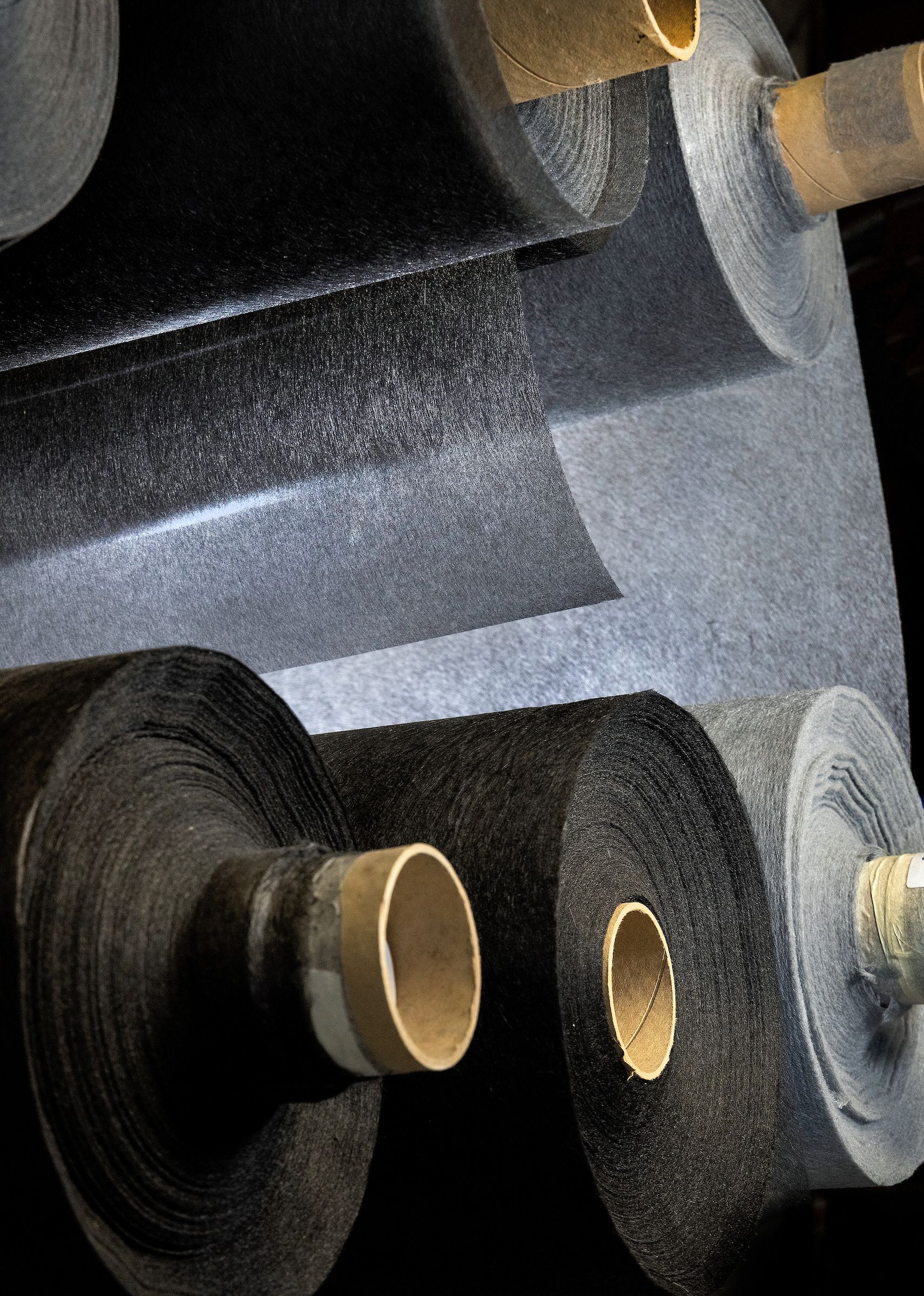 Rolls of electromagnetic interference shielding material